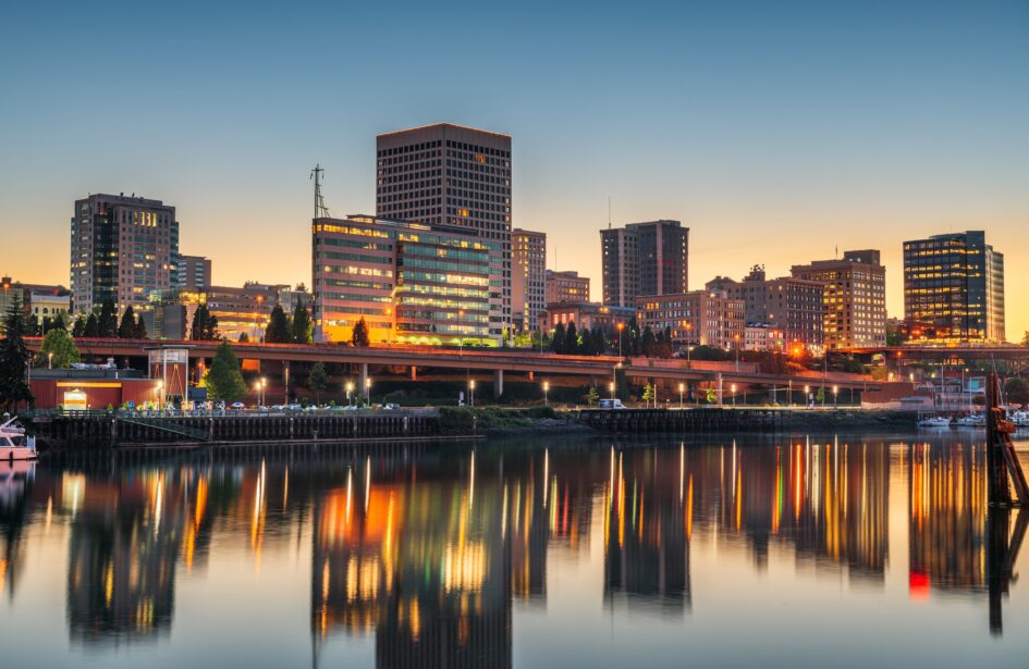Tacoma, Washington, USA downtown skyline at dusk on Commencement Bay.