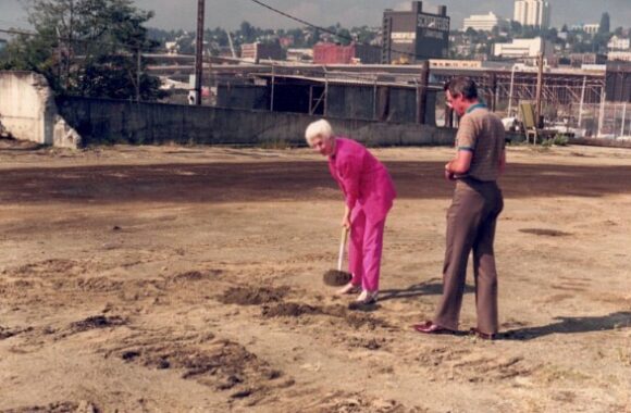 John Woodworth watching his mother, Virginia Woodworth, break ground at the Woodworth & Co. office building near the Thea Foss Waterway.